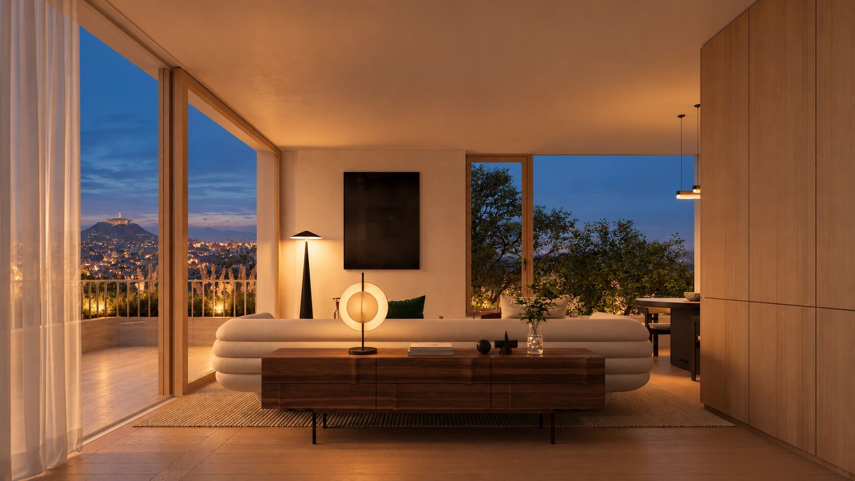 Rumah Marton penthouse living room at night, the city beyond
